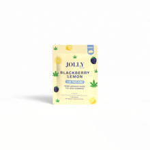 A yellow Jolly Cannabis pouch labeled “Blackberry Lemon Gummies 5mg THC, 125mg CBD” stands on white, featuring fruit puree gummies with berry, lemon, and hemp leaf images—each Indica gummy contains 5mg THC and 5mg CBD.