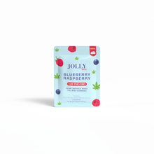 A light blue packet of Jolly Cannabis Blueberry Raspberry Gummies features raspberry, blueberry, and green hemp leaf art. Each gummy contains 5mg THC and 10mg CBD (1:2 ratio). The packet holds a total of 125mg CBD.