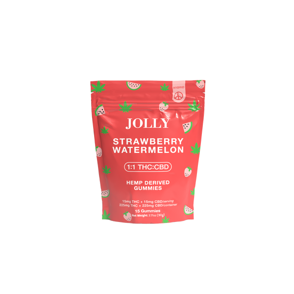 A red resealable pouch of Jolly Cannabis Strawberry Watermelon Gummies features fruit slice art and green hemp leaves, clearly labeled 1:1 15mg THC/15mg CBD per gummy. Each Arizona-made bag contains 15 hemp-derived gummies.
