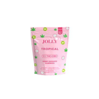 A pink pouch labeled “Jolly Cannabis Tropical Gummies 15mg THC, 15mg CBD” features green cannabis leaves and tropical fruits. Arizona-made, each pack has 15 fruit puree gummies, each with 15mg THC and 15mg CBD.