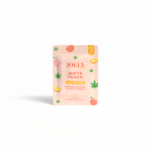 A peach-colored packet labeled “White Peach Gummies 5mg THC, 125mg CBD” from Jolly Cannabis features peach and hemp leaf illustrations. Arizona-made gummies sit on a white background, casting a small shadow.